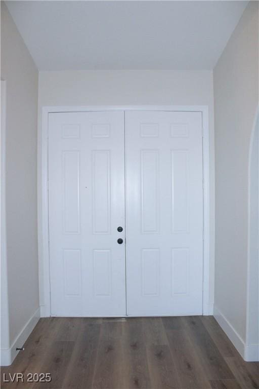 8616 Willow Cabin St, Las Vegas, NV 89131 - entrance foyer with baseboards and wood finished floors