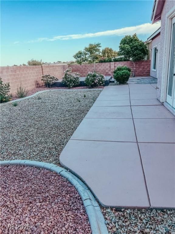 8616 Willow Cabin St, Las Vegas, NV 89131 - fenced backyard featuring a patio