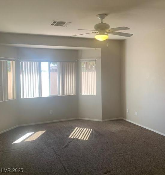 6412 Starling Mesa St, North Las Vegas, NV 89086 - unfurnished room with carpet flooring, a ceiling fan, and baseboards