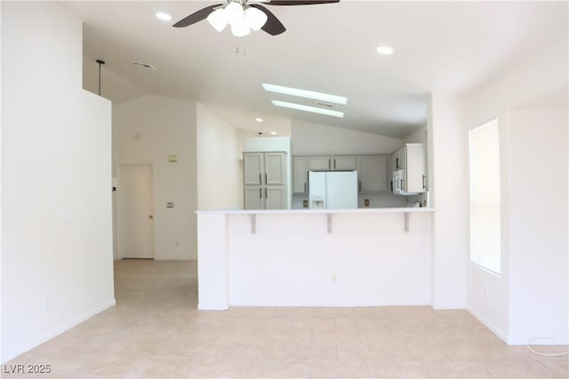 5112 Foggia Ave, Las Vegas, NV 89130 - unfurnished living room featuring vaulted ceiling, ceiling fan, recessed lighting, and baseboards