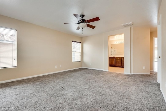 8745 Dodds Canyon St, Las Vegas, NV 89131 - spare room with a ceiling fan and light carpet