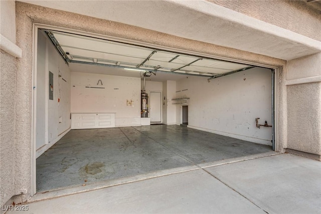8745 Dodds Canyon St, Las Vegas, NV 89131 - garage featuring secured water heater and a garage door opener