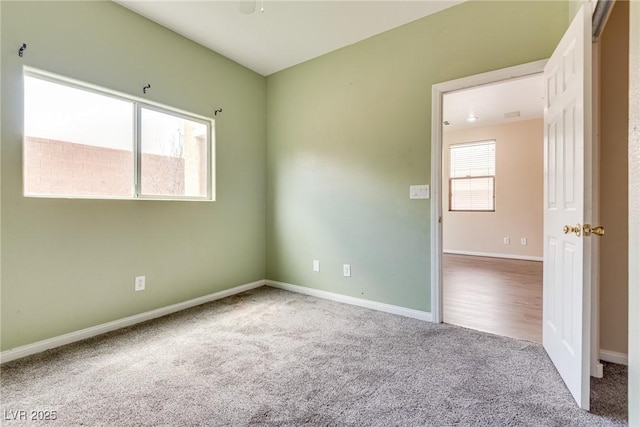 8745 Dodds Canyon St, Las Vegas, NV 89131 - carpeted spare room with baseboards and a ceiling fan