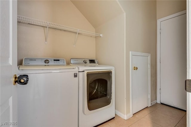 8745 Dodds Canyon St, Las Vegas, NV 89131 - laundry area featuring washing machine and clothes dryer and light tile patterned floors