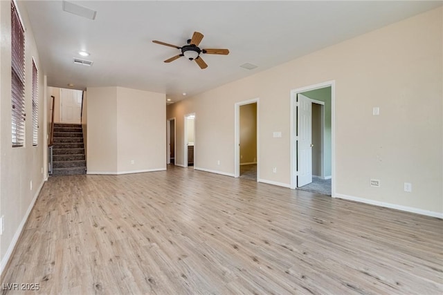 8745 Dodds Canyon St, Las Vegas, NV 89131 - unfurnished living room with light wood-style floors, a ceiling fan, stairway, and recessed lighting