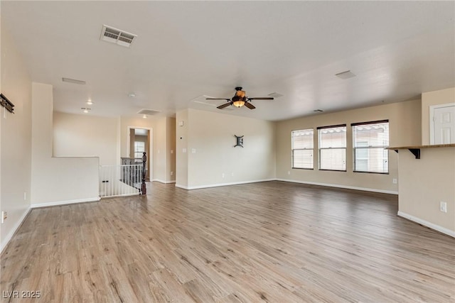 8745 Dodds Canyon St, Las Vegas, NV 89131 - unfurnished living room with wood finished floors and a ceiling fan
