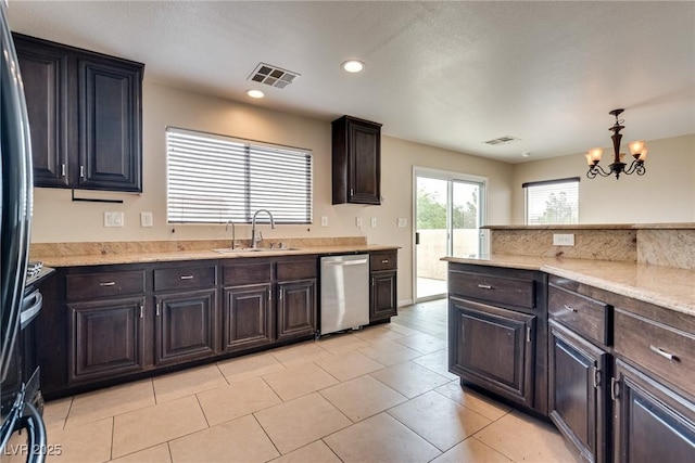 8745 Dodds Canyon St, Las Vegas, NV 89131 - kitchen featuring stainless steel dishwasher, a chandelier, light tile patterned flooring, recessed lighting, and dark brown cabinetry