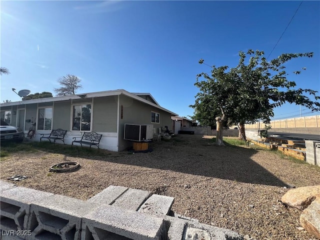 1429 S Sandhill Rd, Las Vegas, NV 89104 - view of side of home featuring a fire pit