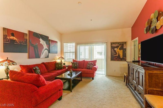8777 Maule Ave Unit 3116, Las Vegas, NV 89148 - living room with carpet, vaulted ceiling, and baseboards