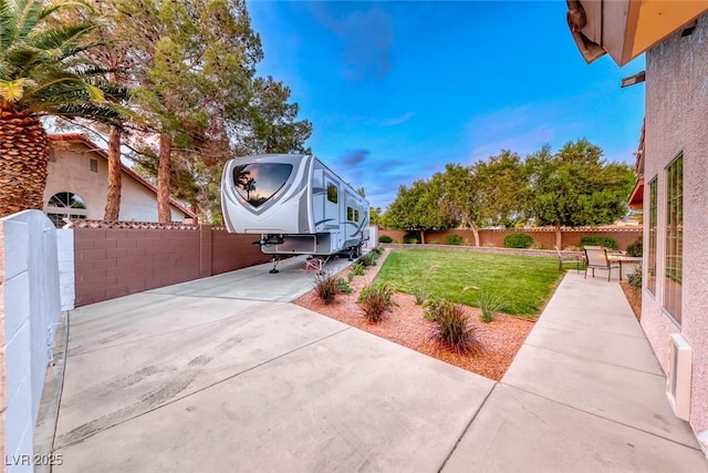 7670 Descanso Ln, Las Vegas, NV 89123 - fenced backyard featuring a patio area