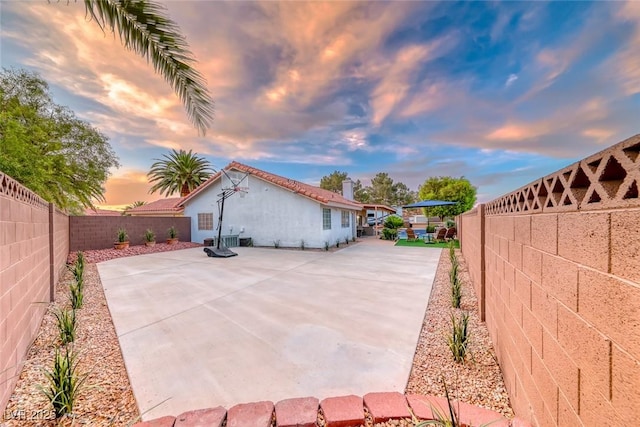 7670 Descanso Ln, Las Vegas, NV 89123 - fenced backyard with a patio area
