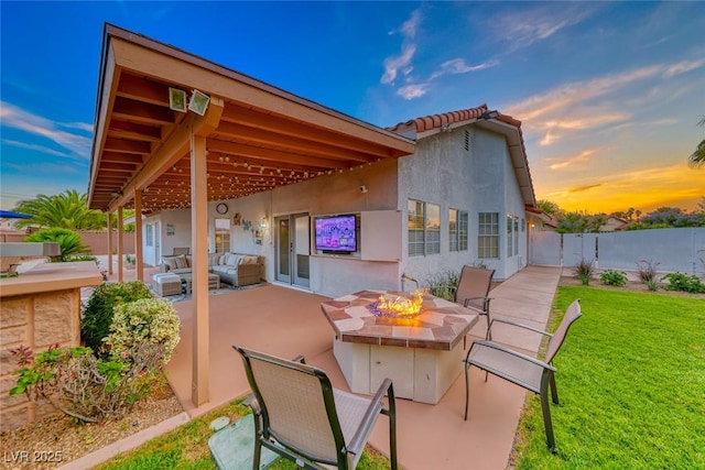 7670 Descanso Ln, Las Vegas, NV 89123 - view of patio / terrace with an outdoor living space with a fire pit