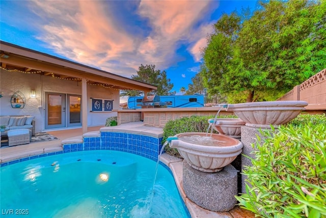 7670 Descanso Ln, Las Vegas, NV 89123 - view of swimming pool with a hot tub and a patio area