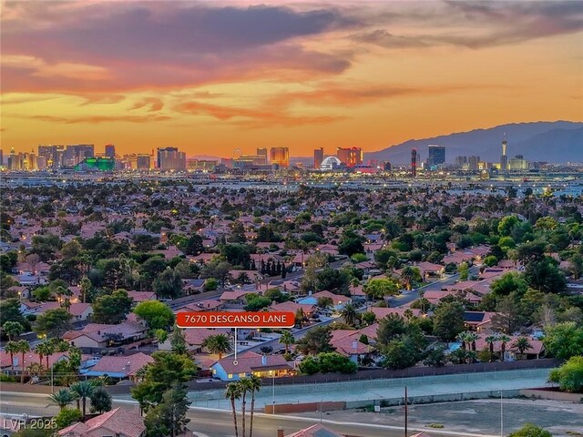 7670 Descanso Ln, Las Vegas, NV 89123 - drone / aerial view of skyline and a mountainous background