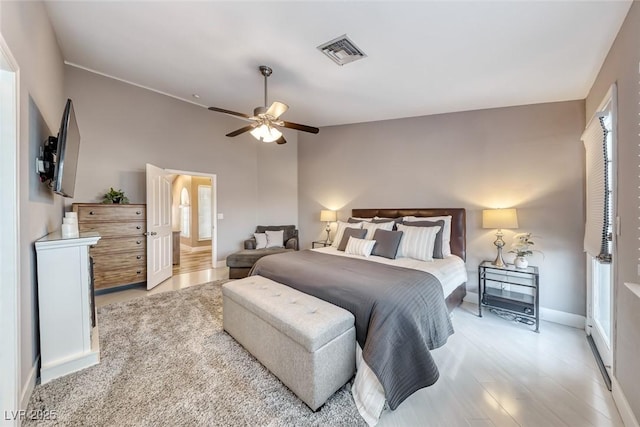 7670 Descanso Ln, Las Vegas, NV 89123 - bedroom featuring wood finished floors, lofted ceiling, and ceiling fan
