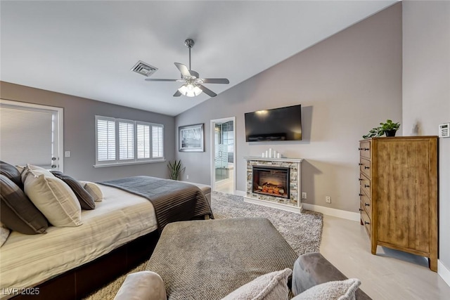 7670 Descanso Ln, Las Vegas, NV 89123 - bedroom featuring lofted ceiling, a fireplace, and a ceiling fan