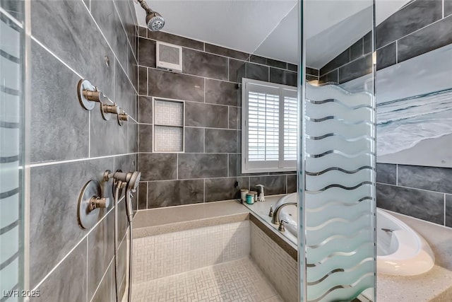 7670 Descanso Ln, Las Vegas, NV 89123 - full bath featuring tile walls, tiled shower, and tiled bath