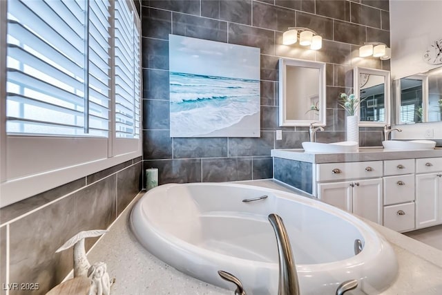 7670 Descanso Ln, Las Vegas, NV 89123 - full bathroom featuring tile walls, a bath, and double vanity