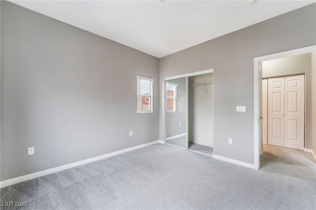9303 Gilcrease Ave Unit 1013, Las Vegas, NV 89149 - unfurnished bedroom with carpet floors, baseboards, and a closet