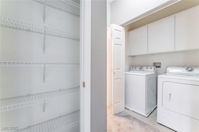 9303 Gilcrease Ave Unit 1013, Las Vegas, NV 89149 - laundry area featuring cabinet space, independent washer and dryer, and light colored carpet