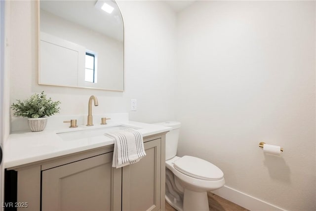 1917 N Moapa Valley Blvd, Logandale, NV 89021 - half bath with vanity, toilet, and baseboards