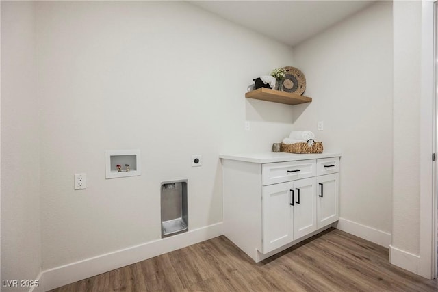 1917 N Moapa Valley Blvd, Logandale, NV 89021 - laundry area with light wood finished floors, hookup for an electric dryer, baseboards, and washer hookup
