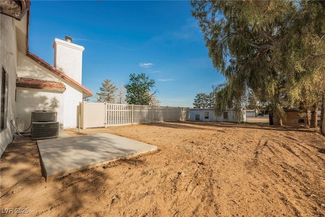 1917 N Moapa Valley Blvd, Logandale, NV 89021 - view of yard with a patio and central air condition unit