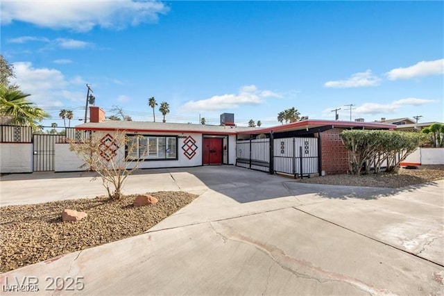 1589 Silver Mesa Way, Las Vegas, NV 89169 - view of front of home featuring concrete driveway and a gate