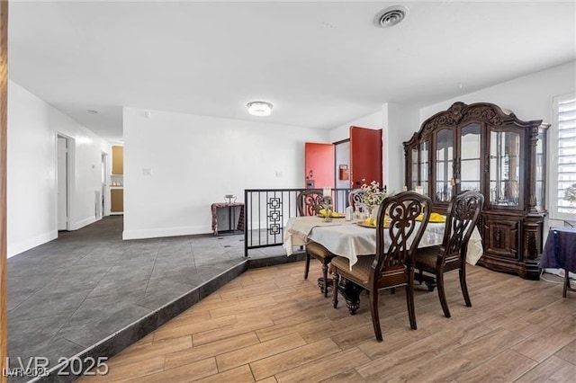 1589 Silver Mesa Way, Las Vegas, NV 89169 - dining space featuring light wood-style floors and baseboards