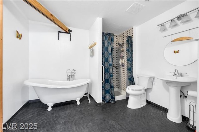 1589 Silver Mesa Way, Las Vegas, NV 89169 - bathroom with toilet, a shower with shower curtain, baseboards, a soaking tub, and a sink