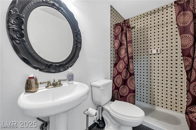 1589 Silver Mesa Way, Las Vegas, NV 89169 - full bath with a shower stall, toilet, and a sink