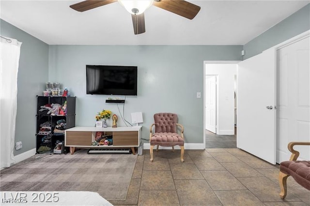 1589 Silver Mesa Way, Las Vegas, NV 89169 - living area featuring a ceiling fan, baseboards, and tile patterned flooring