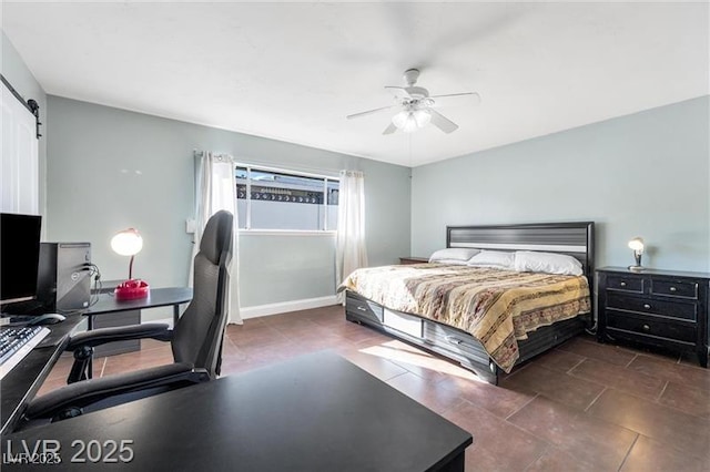 1589 Silver Mesa Way, Las Vegas, NV 89169 - bedroom with a desk, a barn door, ceiling fan, baseboards, and tile patterned flooring