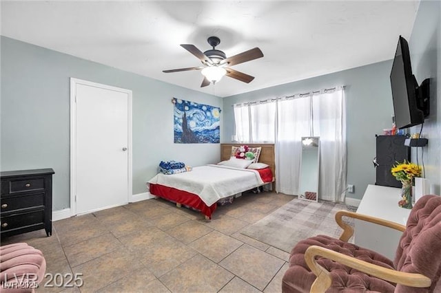 1589 Silver Mesa Way, Las Vegas, NV 89169 - bedroom with baseboards and a ceiling fan