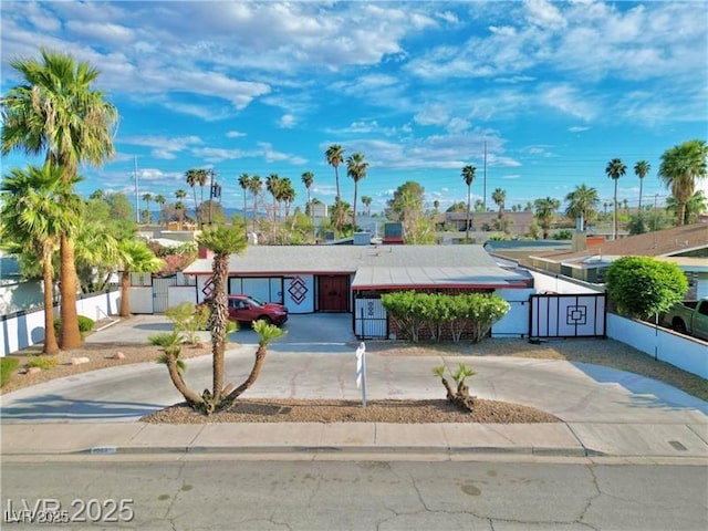 1589 Silver Mesa Way, Las Vegas, NV 89169 - ranch-style home featuring curved driveway and a gate