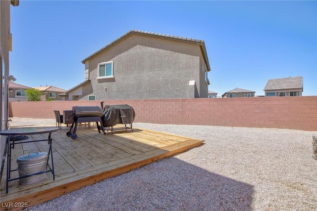 7828 Bright Lodge St, Las Vegas, NV 89139 - fenced backyard featuring a deck and a grill