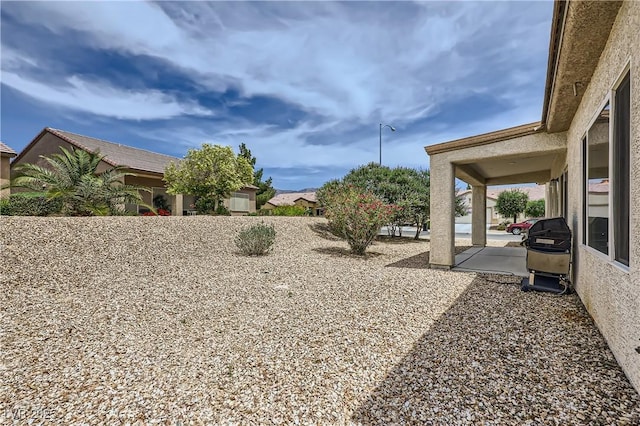 7465 Widewing Dr, North Las Vegas, NV 89084 - view of yard with a patio area