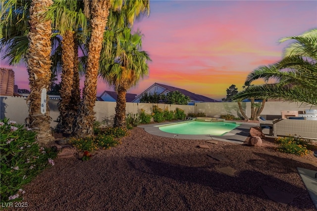 5350 Sharon Marie Ct, Las Vegas, NV 89118 - pool at dusk with a fenced backyard
