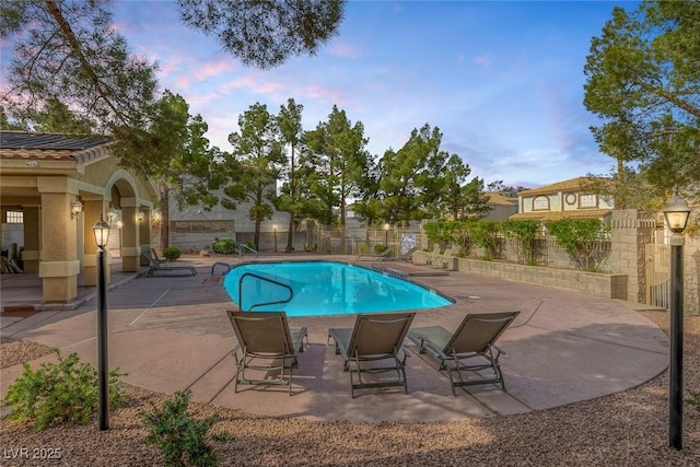 3481 Creek River Dr, Las Vegas, NV 89129 - community pool with a patio area