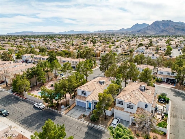 3481 Creek River Dr, Las Vegas, NV 89129 - aerial view of residential area with a mountain backdrop