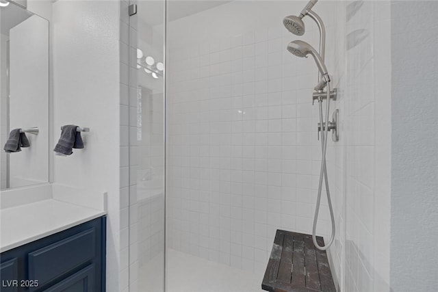 3481 Creek River Dr, Las Vegas, NV 89129 - bathroom featuring vanity and tiled shower
