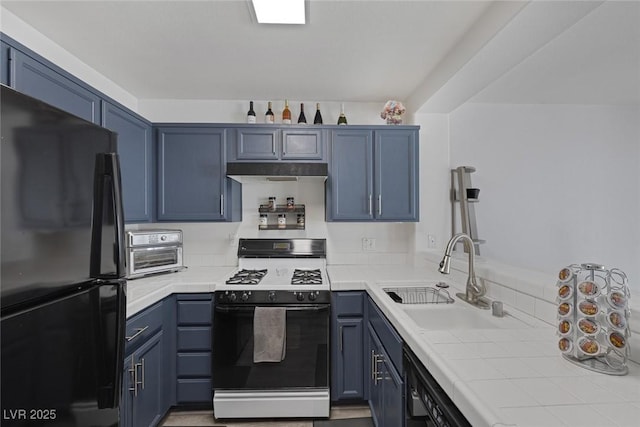 3481 Creek River Dr, Las Vegas, NV 89129 - kitchen featuring black appliances, a sink, tile counters, and blue cabinetry