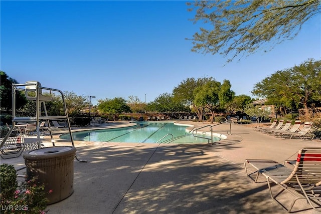 9192 Moose Country Pl, Las Vegas, NV 89178 - community pool featuring a patio area