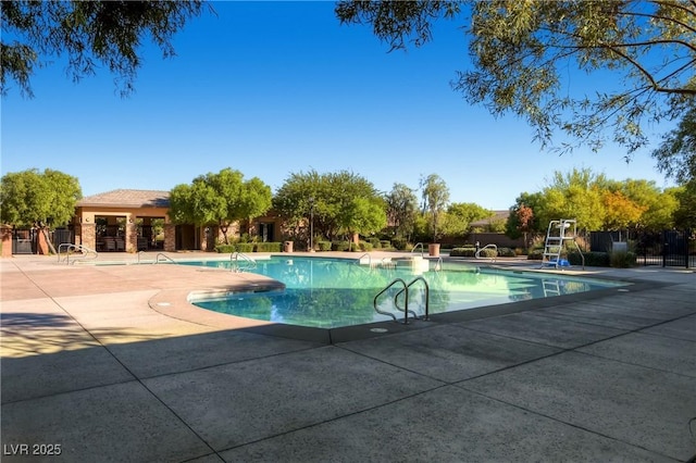 9192 Moose Country Pl, Las Vegas, NV 89178 - community pool featuring a patio area