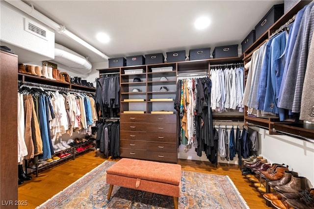 11441 Allerton Park Dr Unit 212, Las Vegas, NV 89135 - spacious closet with wood finished floors