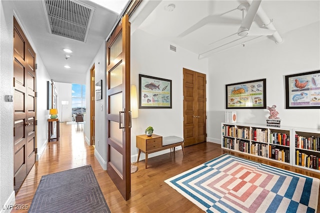 11441 Allerton Park Dr Unit 212, Las Vegas, NV 89135 - hall featuring light wood finished floors, baseboards, and recessed lighting