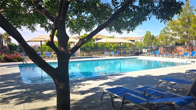 11441 Allerton Park Dr Unit 212, Las Vegas, NV 89135 - community pool featuring a patio area