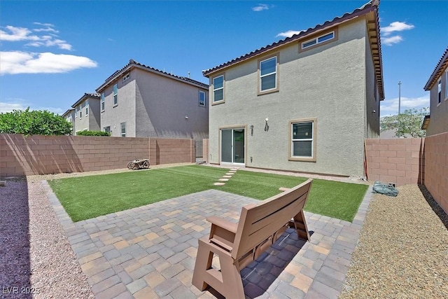 8755 Spanish Ridge Ave, Las Vegas, NV 89148 - back of house with stucco siding, a patio area, and a tile roof