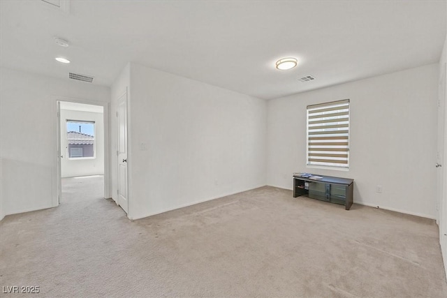 8755 Spanish Ridge Ave, Las Vegas, NV 89148 - spare room featuring light colored carpet and a smoke detector