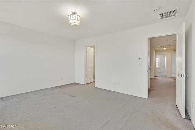 8755 Spanish Ridge Ave, Las Vegas, NV 89148 - carpeted empty room with a smoke detector